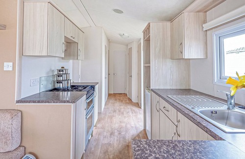 Prestatyn House | Caravan with one double and two twin.