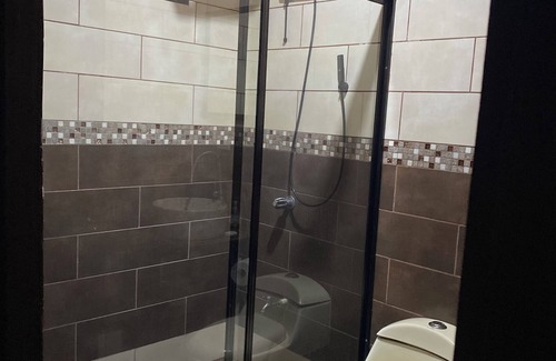 Santa Lucia Apartment | Caribe Rosa Charming 2-bedroom apartment in wonderful Limon with AC, WiFi
