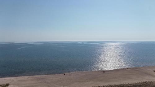 Oscoda House | Carpe Diem 365 - Very Cute Lakefront Condo!