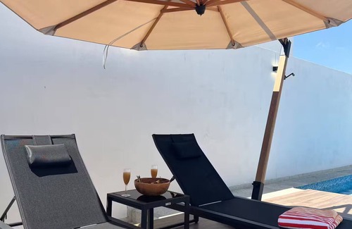 San Luis Potosi Apartment | Carranza Views! Heated Pool, KingBed & WorkSpace