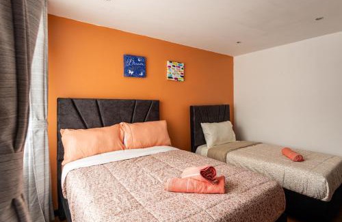 Calle 26 Apartment | Casa amplia en Normandía 8 pax 3 habitaciones y 2 Parqueaderos