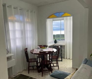 Saco dos Limoes Apartment | Casa c/bela vista para Baía Sul