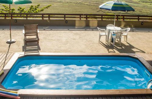 Garopaba House | Casa com piscina e incrível vista para lagoa