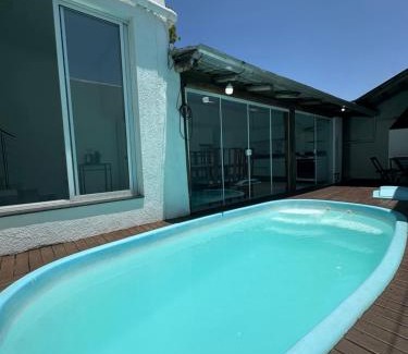 Xangri-La House | Casa com Piscina em Xangri-Lá RS