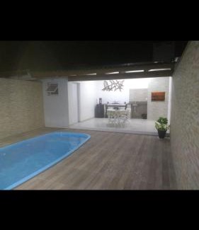 Centro House | Casa com piscina próxima ao Mar