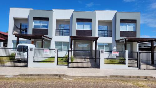 Torres House | Casa de Praia em Torres RS Praia Lagoa jardim
