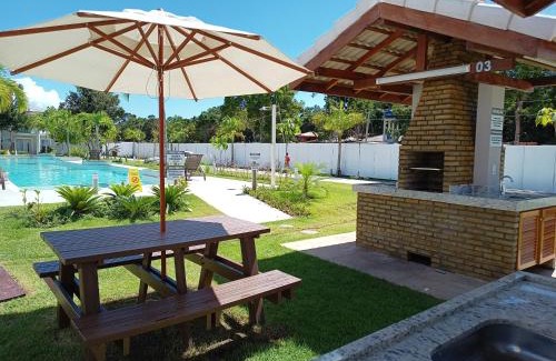 Puerto Seguro Center House | Casa em Arraial D'ajuda -3 suítes, lazer completo- Piscina, Sauna e Beach tênis