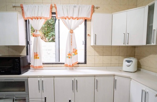 Petropolis House | Casa em Passo Fundo com Churrasqueira