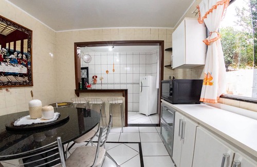 Petropolis House | Casa em Passo Fundo com Churrasqueira