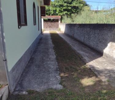 Jacone House | Casa em poucos passos da praia de Jaconé