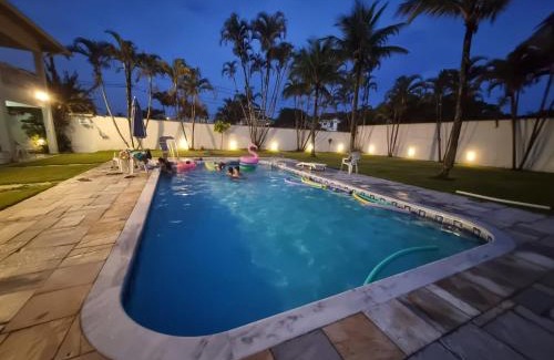 Balneario Praia do Pernambuco House | Casa Eventos e Temporada com 2 suites, piscina, churrasqueira, Wi-Fi, Ar Condicionado - Proximo Praia Mar Casado e Pernambuco - Guaruja -