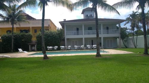 Balneario Praia do Pernambuco House | Casa Eventos e Temporada com 4 suites, piscina, churrasqueira, Wi-Fi, Ar Condicionado - Proximo Praia Mar Casado e Pernambuco - Guaruja -