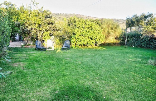 Castiglione della Pescaia House | Casa Melampo: A graceful apartment that covers the entire top floor of an ancient country manor situated in the heart of the Tuscan countryside.