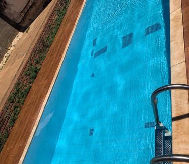 Piumhi House | Casa para festas com piscina e cama elástica