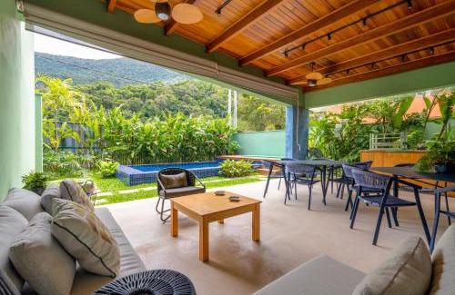 Guaeca House | Casa Patropi na Praia de Guaecá - condomínio fechado, piscina aquecida e internet 500mb