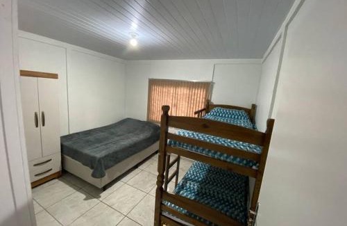 Coronel Vivida House | Casa Uni residencial 03