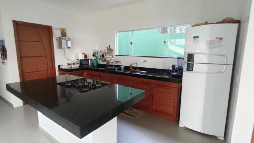 Arraial d'Ajuda House | Casa Verde - Cinco suítes, cond. piscina,1.3km do centro