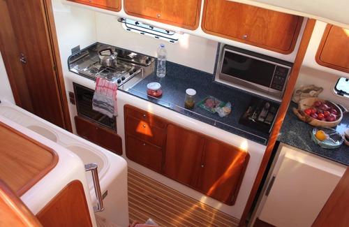 Vlychada Boat Rental | Catamaran cruise with skipper and hostess