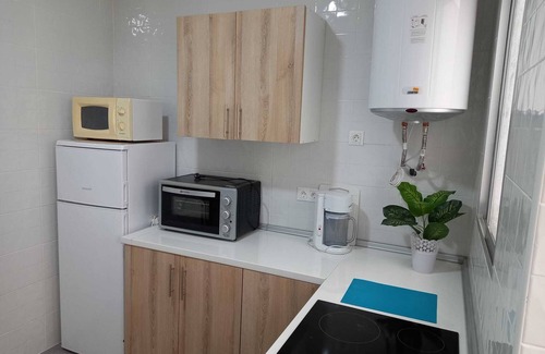 Cruz de Humilladero Apartment | Central Apartment in Malaga with Balcony & Wi-Fi