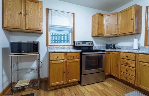 Dubuque House | Centrally located in family friendly neighborhood with off street parking.