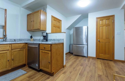 Dubuque House | Centrally located in family friendly neighborhood with off street parking.