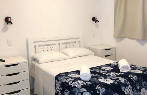 Centro Comercial Apartment | Chalés Porto Perequê