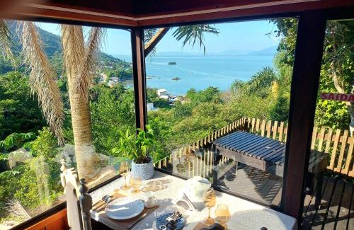 Caiacanga Ski Chalet | Chalézinho na montanha com vista para o mar