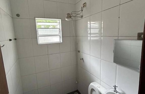 Enseada Ski Chalet | Chale com ar na praia da Enseada