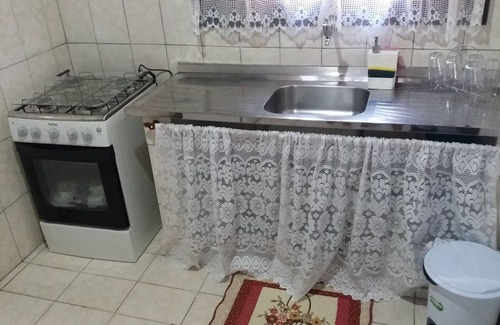 Penedo Ski Chalet | Chalé das Carpas in Penedo in front of the waterfall with full kitchen.