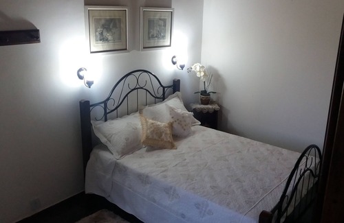 Penedo Ski Chalet | Chalé das Carpas in Penedo in front of the waterfall with full kitchen.