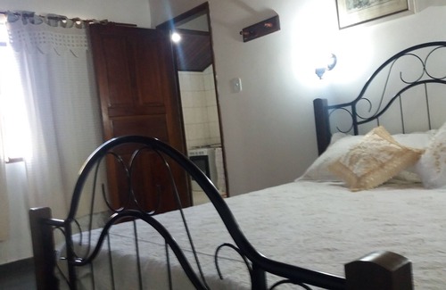 Penedo Ski Chalet | Chalé das Carpas in Penedo in front of the waterfall with full kitchen.