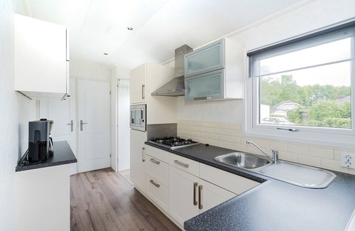 Baarle-Nassau Ski Chalet | Chalet in Parc de Kievit with Private Garden