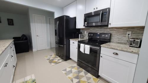 Royal Palm Beach House | Chardonnay- Luxe home with pool ,spa and close to equestrian