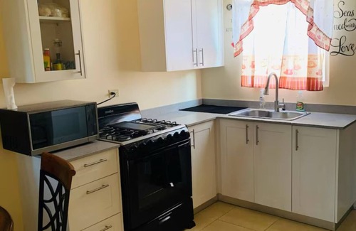 Montego Bay House | Charming 2-bedroom bungalow with WiFi and AC in Montego Bay