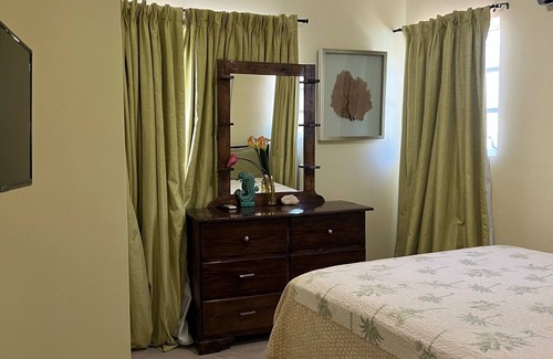 Belair Estates House | Charming 2-bedroom townhome in Nassau with WiFi, AC. Relax and unwind