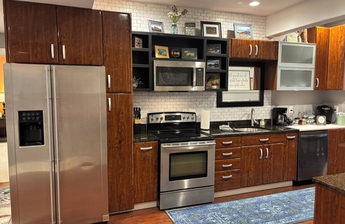 Woodmoor Apartment | Charming 2-bedroom with King Size Beds; WIFI, Private Patio with table and grill