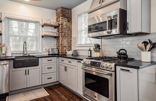 Sans Souci House | Charming 2BR with Fireplace, Pets, Close to Furman