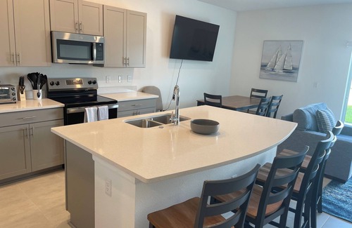 Nokomis House | Charming 3-bedroom townhome with easy access to beach, shops, and restaurants.