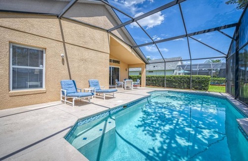 Lake Berkley Villa | Charming 3BR home in Kissimmee with private pool and lake view, perfect for families.