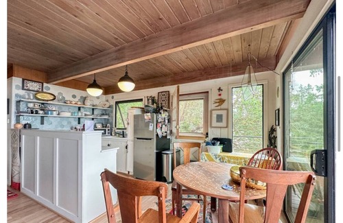 Three Tree Point House | Charming and eclectic treehouse-like home with expansive Puget Sound views