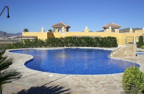 Los Puertos Apartment | Charming and spacious ground floor apartment with own gardens and shared pool