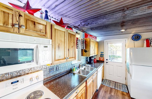 Kingsland House | Charming dog-friendly lakefront home with lake view, dock, & washer/dryer