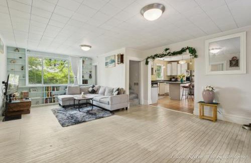 Howard City House | Charming Farmhouse by Stream and fire pit