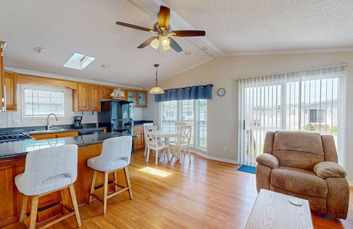 Assateague Pointe House | Charming getaway with modern amenities, tennis court, pool, & private patio