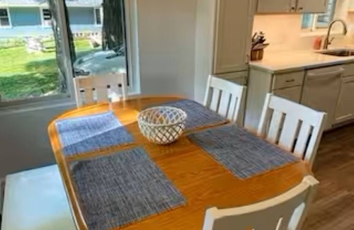 Sodus Point Cottage | Charming Island cottage with dock, accessible by car and boat