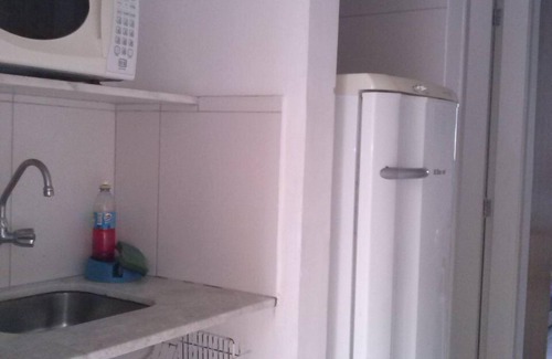 Pitangueiras Apartment | Charming kitnet ideal for couple 100 meters from the beach in Pitangueiras