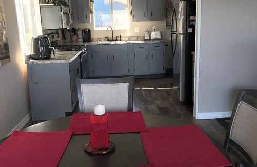 Sheridan House | Charming lakefront cottage with baby grand piano to use by qualified renters.