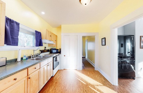 Monson House | Charming, lakefront dog-friendly home with a firepit, dock, & fast WiFi