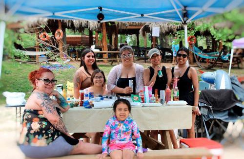 Prairie Lea House | Charming Log Cabin in Texas - Perfect Glamping Vacation on the San Marcos River near Kingsbury