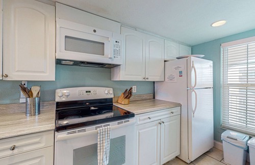 Point East Condo | Charming oceanview condo just steps from the beach